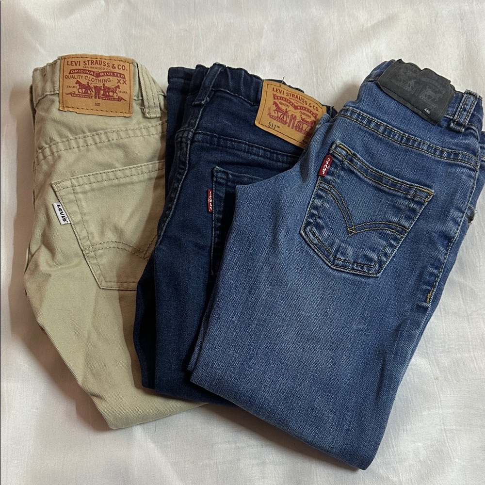 Levi's Boys Jeans - Beige, Dark Blue, and Medium Blue. Size 4